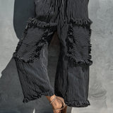 Black and white striped strapless jumpsuit with ruffles